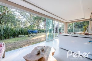 Casa em Condomínio à venda com 568m², 4 dormitórios, 4 suítes, 5 vagas, no bairro Pedra Redonda em PORTO ALEGRE