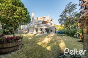 Casa em Condomínio à venda com 568m², 4 dormitórios, 4 suítes, 5 vagas, no bairro Pedra Redonda em PORTO ALEGRE