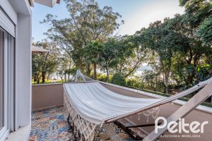 Casa em Condomínio à venda com 568m², 4 dormitórios, 4 suítes, 5 vagas, no bairro Pedra Redonda em PORTO ALEGRE