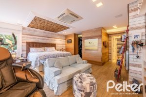 Casa em Condomínio à venda com 568m², 4 dormitórios, 4 suítes, 5 vagas, no bairro Pedra Redonda em PORTO ALEGRE