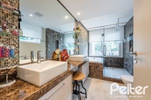 Casa em Condomínio à venda com 568m², 4 dormitórios, 4 suítes, 5 vagas, no bairro Pedra Redonda em PORTO ALEGRE