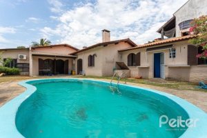 Casa à venda com 361m², 4 dormitórios, 1 suíte, 3 vagas, no bairro Vila Assunção em Porto Alegre