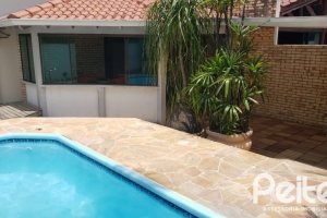 Casa em Condomínio à venda com 300m², 3 dormitórios, 3 suítes, 3 vagas, no bairro Ipanema em Porto Alegre