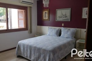 Casa em Condomínio à venda com 300m², 3 dormitórios, 3 suítes, 3 vagas, no bairro Ipanema em Porto Alegre