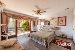 Casa à venda com 365m², 4 dormitórios, 3 suítes, 4 vagas, no bairro Vila Assunção em Porto Alegre