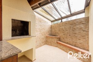 Casa em Condomínio à venda com 273m², 3 dormitórios, 3 suítes, 3 vagas, no bairro Vila Assunção em Porto Alegre