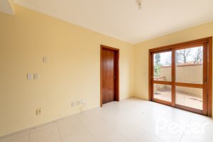 Casa em Condomínio à venda com 273m², 3 dormitórios, 3 suítes, 3 vagas, no bairro Vila Assunção em Porto Alegre