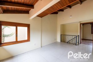 Casa em Condomínio à venda com 273m², 3 dormitórios, 3 suítes, 3 vagas, no bairro Vila Assunção em Porto Alegre
