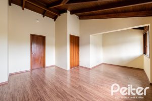 Casa em Condomínio à venda com 273m², 3 dormitórios, 3 suítes, 3 vagas, no bairro Vila Assunção em Porto Alegre