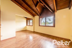 Casa em Condomínio à venda com 273m², 3 dormitórios, 3 suítes, 3 vagas, no bairro Vila Assunção em Porto Alegre