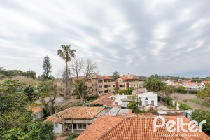 Casa em Condomínio à venda com 273m², 3 dormitórios, 3 suítes, 3 vagas, no bairro Vila Assunção em Porto Alegre