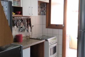 Casa em Condomínio à venda com 148m², 3 dormitórios, 1 suíte, 2 vagas, no bairro Guarujá em Porto Alegre