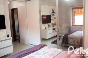 Casa em Condomínio à venda com 148m², 3 dormitórios, 1 suíte, 2 vagas, no bairro Guarujá em Porto Alegre