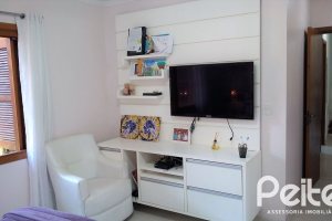 Casa em Condomínio à venda com 148m², 3 dormitórios, 1 suíte, 2 vagas, no bairro Guarujá em Porto Alegre