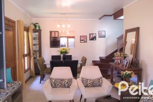 Casa em Condomínio à venda com 148m², 3 dormitórios, 1 suíte, 2 vagas, no bairro Guarujá em Porto Alegre