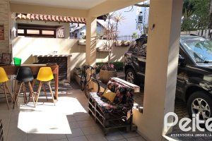 Casa em Condomínio à venda com 148m², 3 dormitórios, 1 suíte, 2 vagas, no bairro Guarujá em Porto Alegre