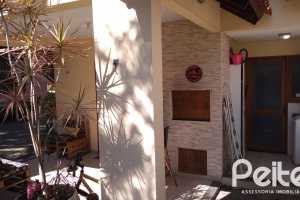 Casa em Condomínio à venda com 148m², 3 dormitórios, 1 suíte, 2 vagas, no bairro Guarujá em Porto Alegre