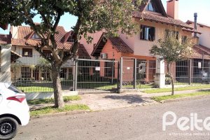Casa em Condomínio à venda com 148m², 3 dormitórios, 1 suíte, 2 vagas, no bairro Guarujá em Porto Alegre