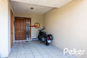 Casa em Condomínio à venda com 233m², 3 dormitórios, 1 suíte, 5 vagas, no bairro Ipanema em Porto Alegre