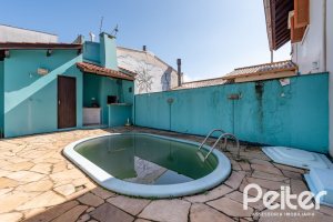 Casa em Condomínio à venda com 233m², 3 dormitórios, 1 suíte, 5 vagas, no bairro Ipanema em Porto Alegre