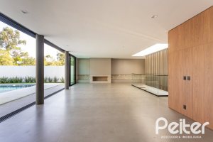 Casa em Condomínio à venda com 434m², 4 dormitórios, 4 suítes, 6 vagas, no bairro Terra Ville em PORTO ALEGRE