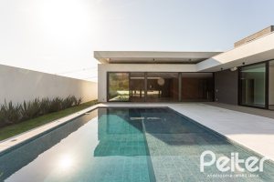 Casa em Condomínio à venda com 434m², 4 dormitórios, 4 suítes, 6 vagas, no bairro Terra Ville em PORTO ALEGRE