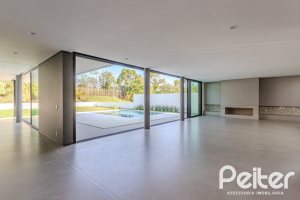 Casa em Condomínio à venda com 434m², 4 dormitórios, 4 suítes, 6 vagas, no bairro Terra Ville em PORTO ALEGRE