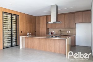 Casa em Condomínio à venda com 434m², 4 dormitórios, 4 suítes, 6 vagas, no bairro Terra Ville em PORTO ALEGRE