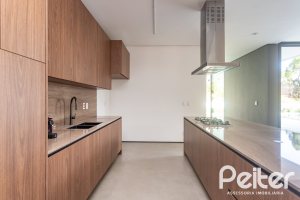 Casa em Condomínio à venda com 434m², 4 dormitórios, 4 suítes, 6 vagas, no bairro Terra Ville em PORTO ALEGRE