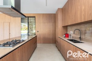 Casa em Condomínio à venda com 434m², 4 dormitórios, 4 suítes, 6 vagas, no bairro Terra Ville em PORTO ALEGRE