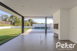 Casa em Condomínio à venda com 434m², 4 dormitórios, 4 suítes, 6 vagas, no bairro Terra Ville em PORTO ALEGRE