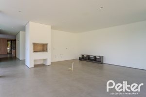 Casa em Condomínio à venda com 434m², 4 dormitórios, 4 suítes, 6 vagas, no bairro Terra Ville em PORTO ALEGRE