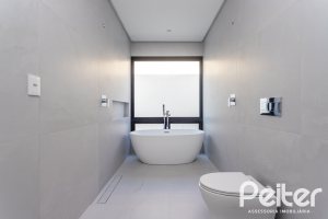 Casa em Condomínio à venda com 434m², 4 dormitórios, 4 suítes, 6 vagas, no bairro Terra Ville em PORTO ALEGRE