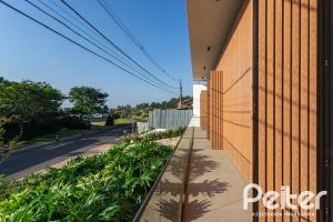 Casa em Condomínio à venda com 434m², 4 dormitórios, 4 suítes, 6 vagas, no bairro Terra Ville em PORTO ALEGRE