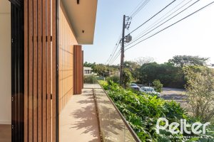 Casa em Condomínio à venda com 434m², 4 dormitórios, 4 suítes, 6 vagas, no bairro Terra Ville em PORTO ALEGRE