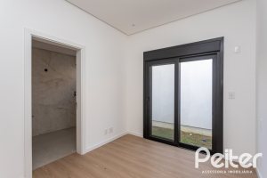 Casa em Condomínio à venda com 434m², 4 dormitórios, 4 suítes, 6 vagas, no bairro Terra Ville em PORTO ALEGRE