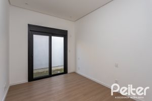 Casa em Condomínio à venda com 434m², 4 dormitórios, 4 suítes, 6 vagas, no bairro Terra Ville em PORTO ALEGRE