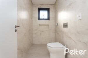 Casa em Condomínio à venda com 434m², 4 dormitórios, 4 suítes, 6 vagas, no bairro Terra Ville em PORTO ALEGRE