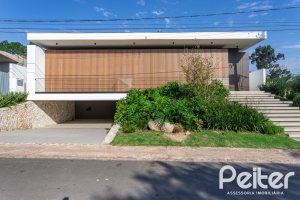 Casa em Condomínio à venda com 434m², 4 dormitórios, 4 suítes, 6 vagas, no bairro Terra Ville em PORTO ALEGRE