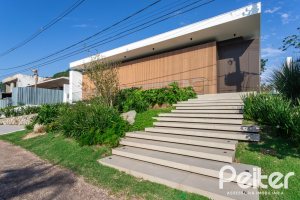 Casa em Condomínio à venda com 434m², 4 dormitórios, 4 suítes, 6 vagas, no bairro Terra Ville em PORTO ALEGRE