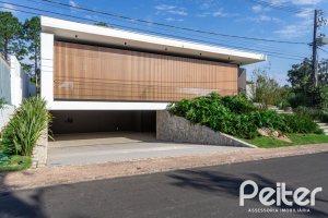 Casa em Condomínio à venda com 434m², 4 dormitórios, 4 suítes, 6 vagas, no bairro Terra Ville em PORTO ALEGRE