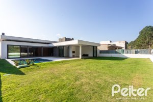 Casa em Condomínio à venda com 434m², 4 dormitórios, 4 suítes, 6 vagas, no bairro Terra Ville em PORTO ALEGRE