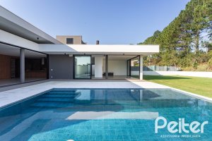 Casa em Condomínio à venda com 434m², 4 dormitórios, 4 suítes, 6 vagas, no bairro Terra Ville em PORTO ALEGRE