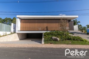 Casa em Condomínio à venda com 434m², 4 dormitórios, 4 suítes, 6 vagas, no bairro Terra Ville em PORTO ALEGRE