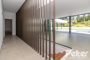 Casa em Condomínio à venda com 434m², 4 dormitórios, 4 suítes, 6 vagas, no bairro Terra Ville em PORTO ALEGRE