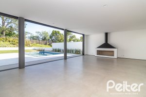 Casa em Condomínio à venda com 434m², 4 dormitórios, 4 suítes, 6 vagas, no bairro Terra Ville em PORTO ALEGRE