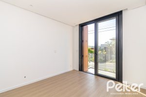 Casa em Condomínio à venda com 434m², 4 dormitórios, 4 suítes, 6 vagas, no bairro Terra Ville em PORTO ALEGRE