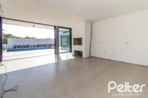 Casa em Condomínio à venda com 434m², 4 dormitórios, 4 suítes, 6 vagas, no bairro Terra Ville em PORTO ALEGRE