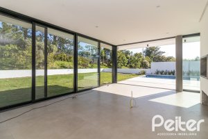 Casa em Condomínio à venda com 434m², 4 dormitórios, 4 suítes, 6 vagas, no bairro Terra Ville em PORTO ALEGRE