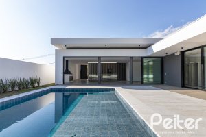 Casa em Condomínio à venda com 434m², 4 dormitórios, 4 suítes, 6 vagas, no bairro Terra Ville em PORTO ALEGRE